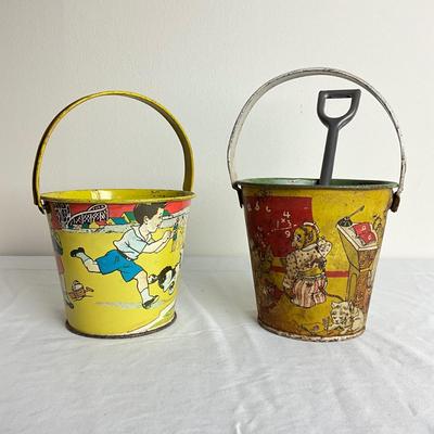 D905 Two Antique Tin Lithographed Sand Pails with Shovel