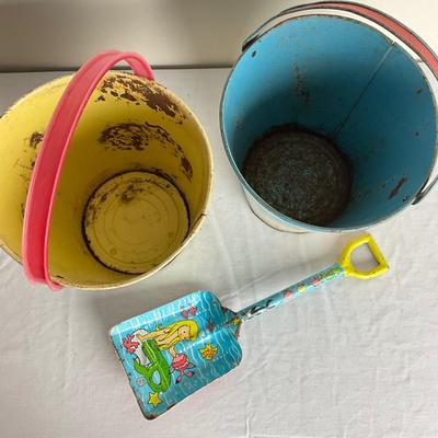 D908 Two J. Chein & Co. Beach Scene Sand Pails with Matching J. Chein Shovel