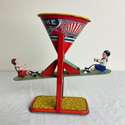 D910 Antique Busy Mike Sand Toy by J. Chein