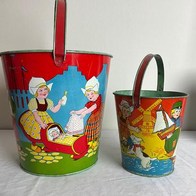 D913 Two Vintage Dutch J. Chein Lithograph Sand Pails with Large Shovel