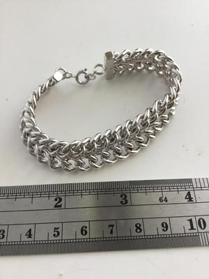 Unmarked. Beautiful silver tone bracelet