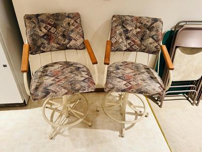 2 CUSHIONED SWIVEL BAR STOOLS