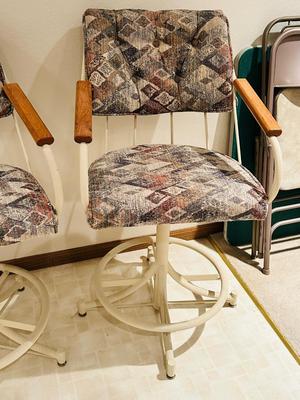 2 CUSHIONED SWIVEL BAR STOOLS