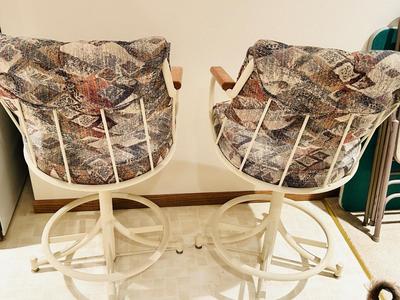 2 CUSHIONED SWIVEL BAR STOOLS