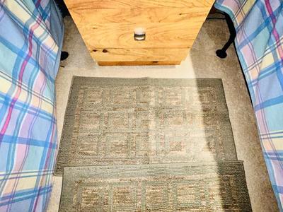 NEW AND LIKE NEW RUGS