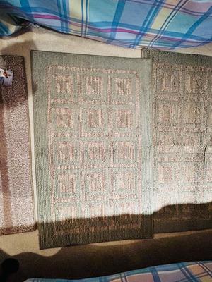 NEW AND LIKE NEW RUGS