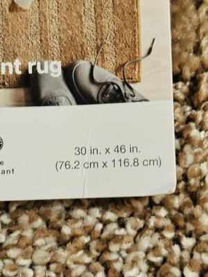 NEW AND LIKE NEW RUGS