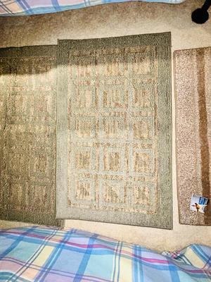 NEW AND LIKE NEW RUGS