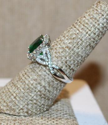 Size 7 Emerald Cut Green Stone Ring with Full Surround & Side Accents on a Silver Tone Band (4.3g)