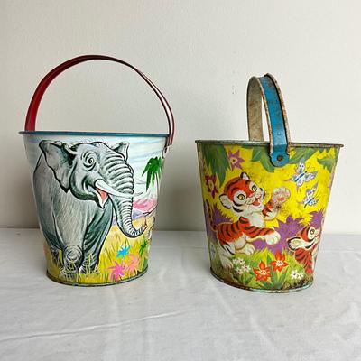 D919 Two Vintage Jungle Safari Themed Tin Sand Pails