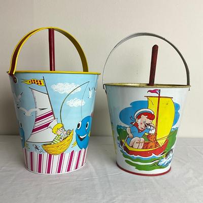 D924 US Metal Toy Co. & J. Chein Sand pails and 2 red shovels