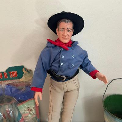 D987 John Wayne Porcelain Doll with Sand Pail, Belt, Mugs, Toys
