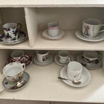 UBA1258 Vintage White Painted Child's Cabinet with Demitasse Cup and Saucers