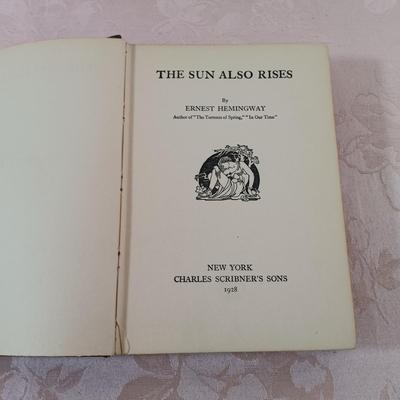 LOT 2: Ernest Hemingway's The Sun Also Rises 1928 from Charles Scribner's Sons, Henry Miller 1948 Smile at the Foot of the...