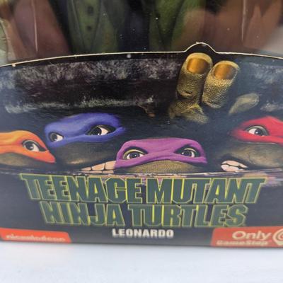 LOT 11: "Heroes in a Half Shell" TMNT Action Figures NIB