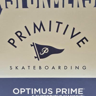LOT 17: Transformers primitive Skateboarding Optimus Prime & Shreddicus Maximus NIB