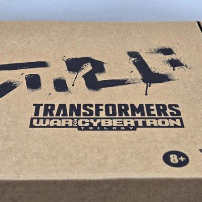 LOT 18: Two Transformers Deluxe Class Deep Cover WFC- GS23 NIB