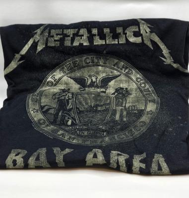 LOT 24: Two Metallica Shirts, Iron Maiden Bag, Two Metallica Blu-rays and one DVD