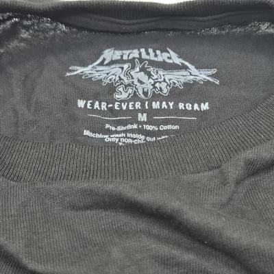 LOT 24: Two Metallica Shirts, Iron Maiden Bag, Two Metallica Blu-rays and one DVD