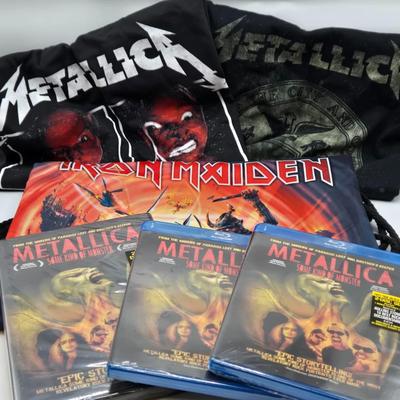 LOT 24: Two Metallica Shirts, Iron Maiden Bag, Two Metallica Blu-rays and one DVD