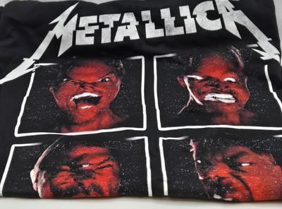 LOT 24: Two Metallica Shirts, Iron Maiden Bag, Two Metallica Blu-rays and one DVD