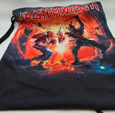 LOT 24: Two Metallica Shirts, Iron Maiden Bag, Two Metallica Blu-rays and one DVD