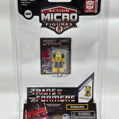 LOT 28: World's Smallest Action Micro Figures/ 3 Optimus Prime and 2 Bumblebees NIP