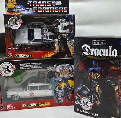 LOT 33: Transformers Ectotron Ecto-1, Draculus, and Gigawatt NIB