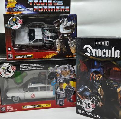 LOT 33: Transformers Ectotron Ecto-1, Draculus, and Gigawatt NIB
