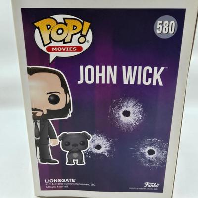 LOT 34: Multiple Funko Pops Including Halo Master Chief, The Child, John Wick, and More NIB