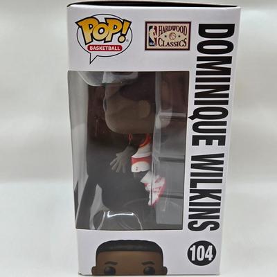 LOT 40: Variety of Funko Pops Including Predator, Batman, and Muhammad Ali NIB