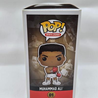 LOT 40: Variety of Funko Pops Including Predator, Batman, and Muhammad Ali NIB