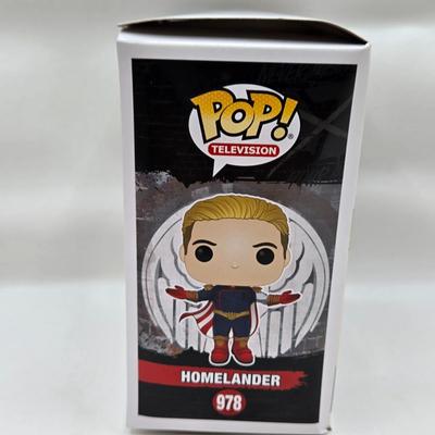LOT 40: Variety of Funko Pops Including Predator, Batman, and Muhammad Ali NIB