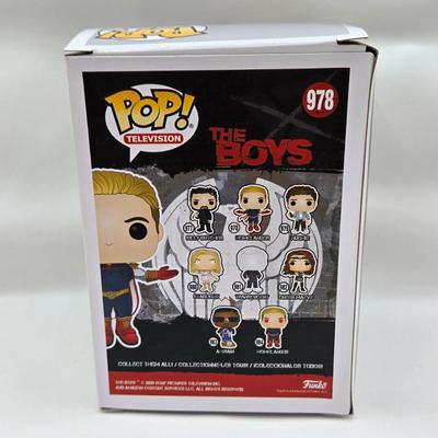 LOT 40: Variety of Funko Pops Including Predator, Batman, and Muhammad Ali NIB