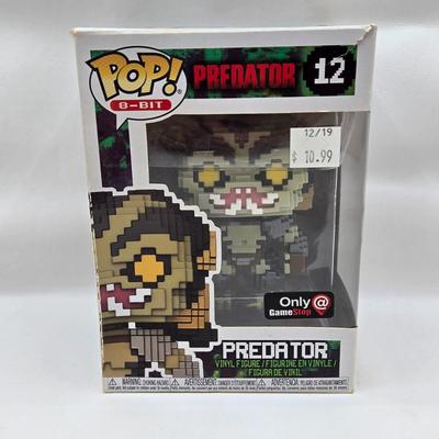 LOT 40: Variety of Funko Pops Including Predator, Batman, and Muhammad Ali NIB