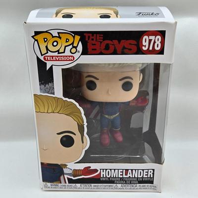 LOT 40: Variety of Funko Pops Including Predator, Batman, and Muhammad Ali NIB