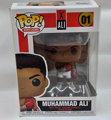 LOT 40: Variety of Funko Pops Including Predator, Batman, and Muhammad Ali NIB