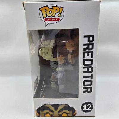 LOT 40: Variety of Funko Pops Including Predator, Batman, and Muhammad Ali NIB