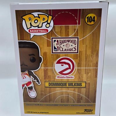 LOT 40: Variety of Funko Pops Including Predator, Batman, and Muhammad Ali NIB