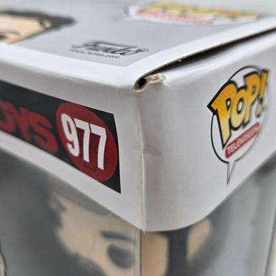 LOT 40: Variety of Funko Pops Including Predator, Batman, and Muhammad Ali NIB