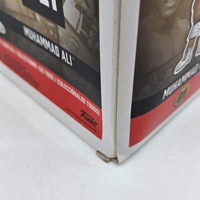 LOT 40: Variety of Funko Pops Including Predator, Batman, and Muhammad Ali NIB