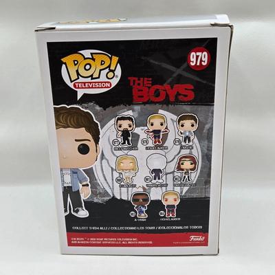 LOT 40: Variety of Funko Pops Including Predator, Batman, and Muhammad Ali NIB