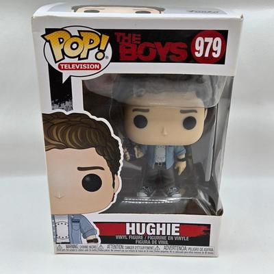 LOT 40: Variety of Funko Pops Including Predator, Batman, and Muhammad Ali NIB
