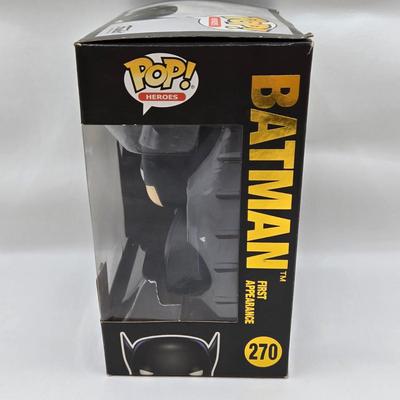 LOT 40: Variety of Funko Pops Including Predator, Batman, and Muhammad Ali NIB