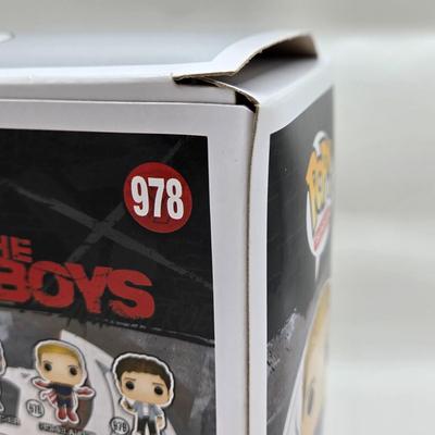 LOT 40: Variety of Funko Pops Including Predator, Batman, and Muhammad Ali NIB
