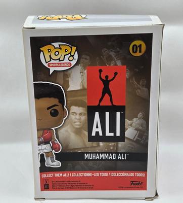 LOT 40: Variety of Funko Pops Including Predator, Batman, and Muhammad Ali NIB