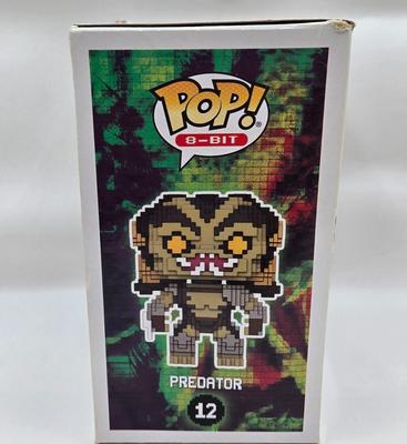 LOT 40: Variety of Funko Pops Including Predator, Batman, and Muhammad Ali NIB