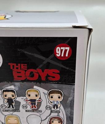LOT 40: Variety of Funko Pops Including Predator, Batman, and Muhammad Ali NIB