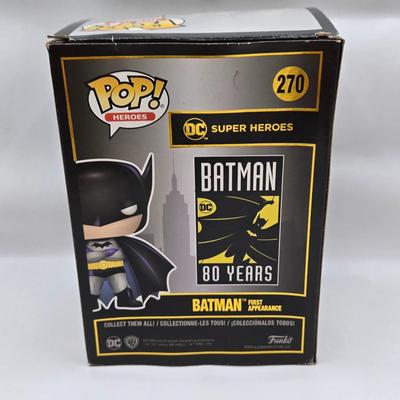 LOT 40: Variety of Funko Pops Including Predator, Batman, and Muhammad Ali NIB