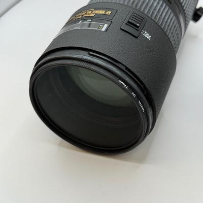 LOT 43: Nikon ED AF Nikkor 80-200mm 1:2.8 D f/2.8 Telephoto Lens w/ Quantaray 77mm UV Filter & Nikon HB-7 Lens Hood